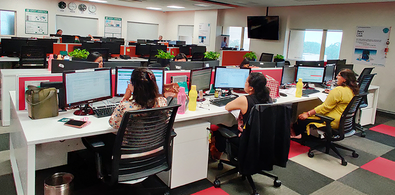 Mumbai staff members now using reusable Tupperware water bottles