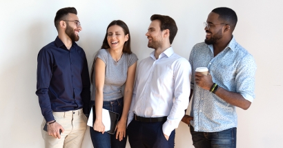 Photo of young professionals laughing and smiling